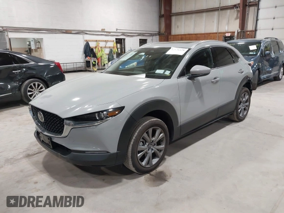 2025 Mazda CX-30 S Premium with VIN 3MVDMBDM5SM788786, listed as a IAAI auction lot 42126428 with 1,370 mi miles and . Bid and sale history available at DreamBid. Image 2.