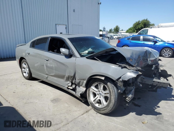 2019 Dodge Charger SXT with VIN 2C3CDXBGXKH659890, listed as a Copart auction lot 58011735 with 112,293 mi miles and Salvage title. Bid and sale history available at DreamBid. Image 4.