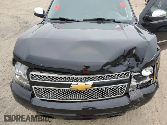2014 Chevrolet Tahoe LTZ z VIN 1GNSCCE04ER156563, wystawiony jako Copart lot #44647735 z przebiegiem 135 849 mil mil oraz Czysty tytuł • Clean title. Historia ofert i sprzedaży dostępna na DreamBid. Obrazek 13.