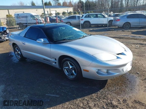2000 Pontiac Firebird Firebird z VIN 2G2FS22K5Y2161683, wystawiony jako IAAI lot #41690780 z przebiegiem 78 976 mil mil oraz . Historia ofert i sprzedaży dostępna na DreamBid. Obrazek 1.