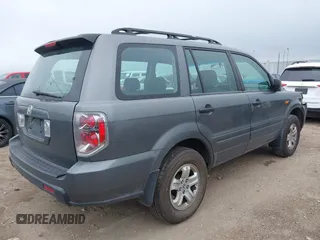 2007 Honda Pilot LX with VIN 5FNYF281X7B006877, listed as a IAAI auction lot 41595667 with 255,799 mi miles. Bid and sale history available at carsss.com. Image 4.