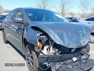 2018 Nissan Sentra SV with VIN 3N1AB7AP3JL633148, listed as a IAAI auction lot 41983588 with 148,479 mi miles and . Bid and sale history available at DreamBid. Image 1.