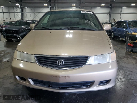 2000 Honda Odyssey EX with VIN 2HKRL1875YH611548, listed as a Copart auction lot 56593275 with 191,533 mi miles and Salvage title. Bid and sale history available at DreamBid. Image 5.