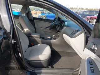 2013 Kia Optima LX with VIN 5XXGM4A77DG146177, listed as a IAAI auction lot 41769708 with 133,604 mi miles. Bid and sale history available at carsss.com. Image 5.