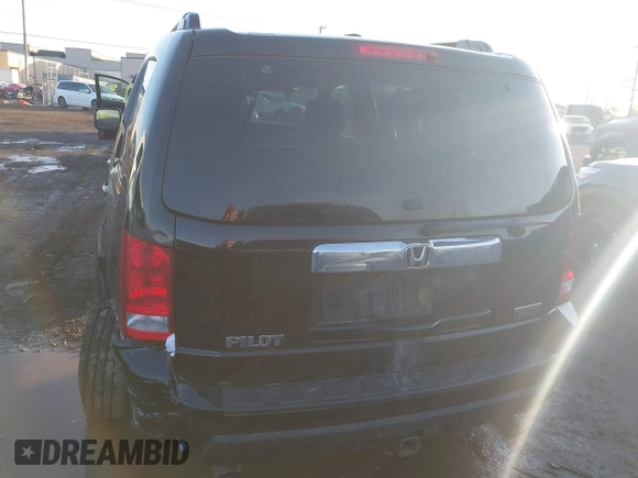 2009 Honda Pilot EX-L with VIN 5FNYF48659B012032, listed as a IAAI auction lot 41801232 with 205,636 mi miles and . Bid and sale history available at carsss.com. Image 16.