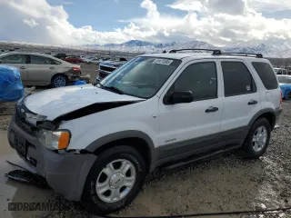 2002 Ford Escape Limited with VIN 1FMCU04152KA63778, listed as a Copart auction lot 51471585 with 103,803 mi miles and Salvage Title. Bid and sale history available at carsss.com. Image 1.