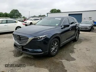 2021 Mazda CX-9 Touring with VIN JM3TCACY2M0512867, listed as a Copart auction lot 56646615 with 92,566 mi miles and Salvage title. Bid and sale history available at DreamBid. Image 14.