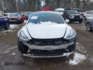 2020 Tesla Model 3 Long Range with VIN 5YJ3E1EB6LF784169, listed as a IAAI auction lot 40957226 with 96,415 mi miles. Bid and sale history available at carsss.com. Image 13.