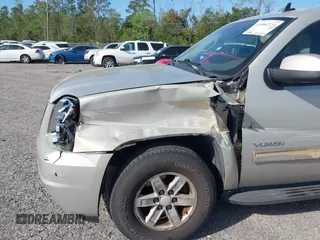 2010 GMC Yukon SLT with VIN 1GKMCCE3XAR225380, listed as a IAAI auction lot 41904723 with 173,686 mi miles. Bid and sale history available at carsss.com. Image 6.