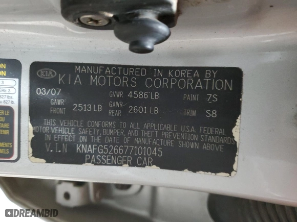2007 Kia Rondo EX with VIN KNAFG526677101045, listed as a Copart auction lot 82483754 with 152,572 mi miles and Salvage Title. Bid and sale history available at carsss.com. Image 13.