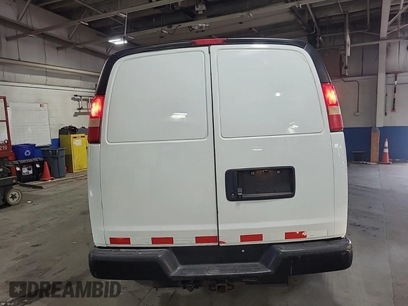 2015 Chevrolet Express Cargo with VIN 1GCWGFCF9F1167047, listed as a IAAI auction lot 42666478 with 169,647 mi miles and . Bid and sale history available at DreamBid. Image 3.