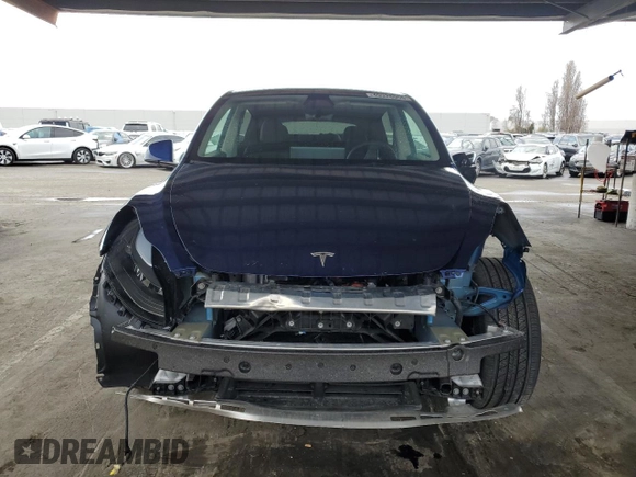 2024 Tesla Model Y Long Range with VIN 7SAYGDEE6RF025366, listed as a Copart auction lot 49328055 with 10,319 mi miles and Salvage Title. Bid and sale history available at DreamBid. Image 5.