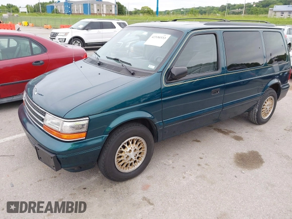 1994 Plymouth Voyager z VIN 2P4GH45R1RR703949, wystawiony jako IAAI lot #42330333 z przebiegiem 67 672 mil mil oraz . Historia ofert i sprzedaży dostępna na DreamBid. Obrazek 2.