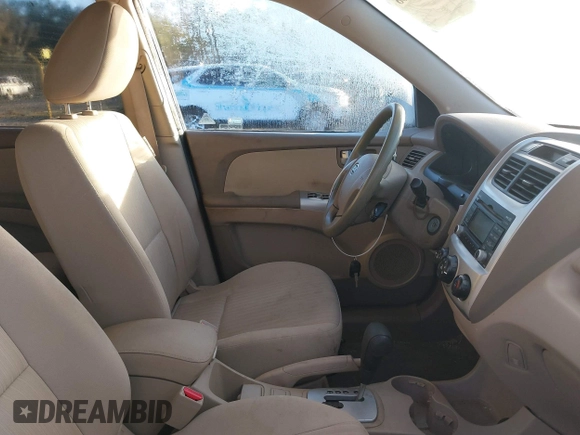2009 Kia Sportage LX with VIN KNDJE723397585036, listed as a IAAI auction lot 41331868 with 208,268 mi miles and . Bid and sale history available at carsss.com. Image 5.