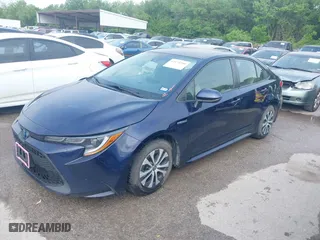 2020 Toyota Corolla Hybrid LE with VIN JTDEBRBE4LJ010266, listed as a IAAI auction lot 42074390 with 267,295 mi miles. Bid and sale history available at carsss.com. Image 20.