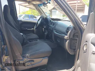 2004 Jeep Liberty Sport with VIN 1J4GK48KX4W241129, listed as a IAAI auction lot 41980258 with 259,048 mi miles and . Bid and sale history available at DreamBid. Image 5.
