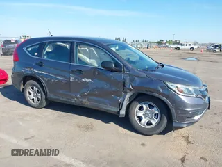 2015 Honda CR-V LX with VIN 3CZRM3H31FG709059, listed as a IAAI auction lot 42131551 with 98,738 mi miles and . Bid and sale history available at carsss.com. Image 6.