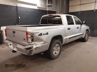 2005 Dodge Dakota SLT with VIN 1D7HW48N15S164352, listed as a IAAI auction lot 42190403 with 150,794 mi miles and . Bid and sale history available at carsss.com. Image 4.