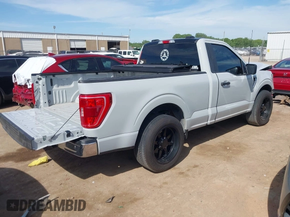 2023 Ford F-150 XL with VIN 1FTMF1C53PKF34184, listed as a IAAI auction lot 42242703 with 27,312 mi miles and . Bid and sale history available at DreamBid. Image 4.