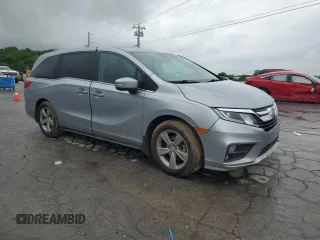 2018 Honda Odyssey EX-L z VIN 5FNRL6H74JB033475, wystawiony jako Copart lot #55736415 z przebiegiem 104 108 mil mil oraz Szkoda całkowita • Salvage title. Historia ofert i sprzedaży dostępna na DreamBid. Obrazek 4.