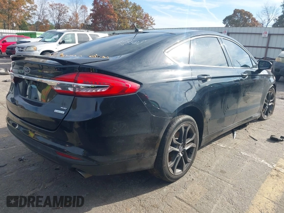 2018 Ford Fusion SE with VIN 3FA6P0HDXJR157605, listed as a IAAI auction lot 40979897 with 128,322 mi miles. Bid and sale history available at carsss.com. Image 4.