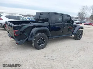2022 Jeep Gladiator Rubicon with VIN 1C6JJTBG7NL145501, listed as a IAAI auction lot 41506842 with 20,593 mi miles. Bid and sale history available at carsss.com. Image 4.