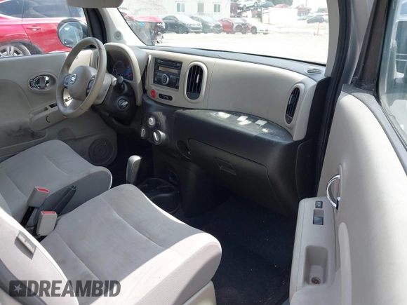 2011 Nissan Cube 1.8 SL with VIN JN8AZ2KR7BT210926, listed as a IAAI auction lot 42128051 with 169,746 mi miles. Bid and sale history available at carsss.com. Image 5.