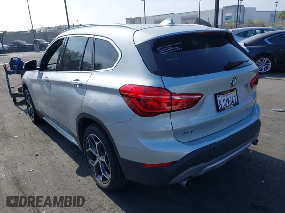 2019 BMW X1 xDrive28i with VIN WBXHT3C56K5L38658, listed as a IAAI auction lot 42496734 with 49,373 mi miles and . Bid and sale history available at DreamBid. Image 3.