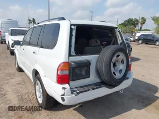 2003 Suzuki XL7 Touring z VIN JS3TY92V534106381, wystawiony jako IAAI lot #42063755 z przebiegiem 190 917 mil mil oraz . Historia ofert i sprzedaży dostępna na DreamBid. Obrazek 3.