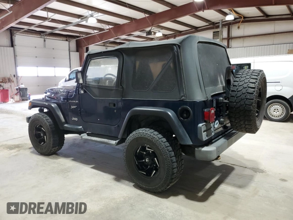 2002 Jeep Wrangler Sport with VIN 1J4FA49S82P703420, listed as a Copart auction lot 53322175 with 87,642 mi miles and Salvage Title. Bid and sale history available at carsss.com. Image 2.