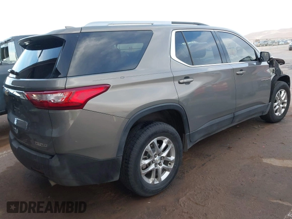 2018 Chevrolet Traverse LT Cloth z VIN 1GNERGKW9JJ173766, wystawiony jako IAAI lot #41336426 z przebiegiem 108 910 mil mil oraz . Historia ofert i sprzedaży dostępna na DreamBid. Obrazek 4.