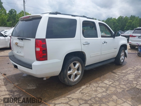 2013 Chevrolet Tahoe LS with VIN 1GNSCAE01DR260799, listed as a IAAI auction lot 42496680 with 199,276 mi miles and . Bid and sale history available at DreamBid. Image 4.