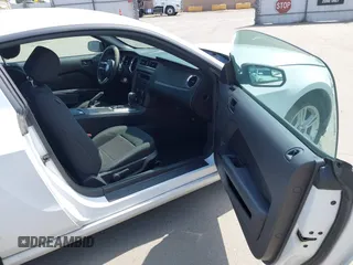 2014 Ford Mustang V6 with VIN 1ZVBP8AMXE5245688, listed as a IAAI auction lot 42074539 with 146,028 mi miles. Bid and sale history available at carsss.com. Image 5.