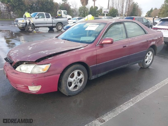 1997 Lexus ES 300 Luxury Sport Sdn with VIN JT8BF22G3V5007899, listed as a IAAI auction lot 41583577 with 1 mi miles. Bid and sale history available at carsss.com. Image 2.