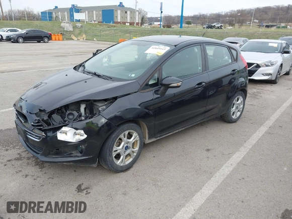 2015 Ford Fiesta SE z VIN 3FADP4EJ3FM115466, wystawiony jako IAAI lot #41849165 z przebiegiem 178 002 mil mil oraz . Historia ofert i sprzedaży dostępna na DreamBid. Obrazek 2.
