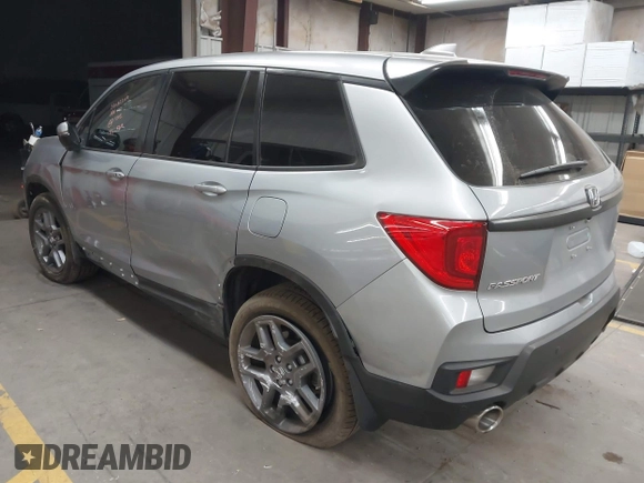 2023 Honda Passport EX-L with VIN 5FNYF8H56PB025612, listed as a IAAI auction lot 41937956 with 31,065 mi miles and . Bid and sale history available at DreamBid. Image 3.