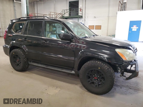 2004 Lexus GX 470 with VIN JTJBT20X740025411, listed as a Copart auction lot 55363145 with 329,164 mi miles and Salvage Title. Bid and sale history available at DreamBid. Image 4.