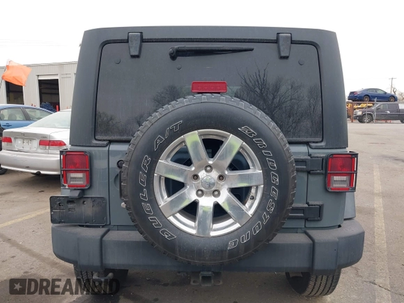 2014 Jeep Wrangler Unlimited Sport with VIN 1C4BJWDG4EL319259, listed as a IAAI auction lot 41494299 with 141,699 mi miles. Bid and sale history available at carsss.com. Image 16.
