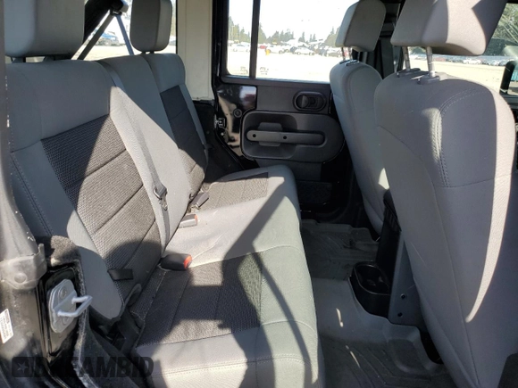 2009 Jeep Wrangler Unlimited X with VIN 1J4GZ39139L742349, listed as a Copart auction lot 46610165 with 57,652 mi miles and Salvage Title. Bid and sale history available at carsss.com. Image 10.
