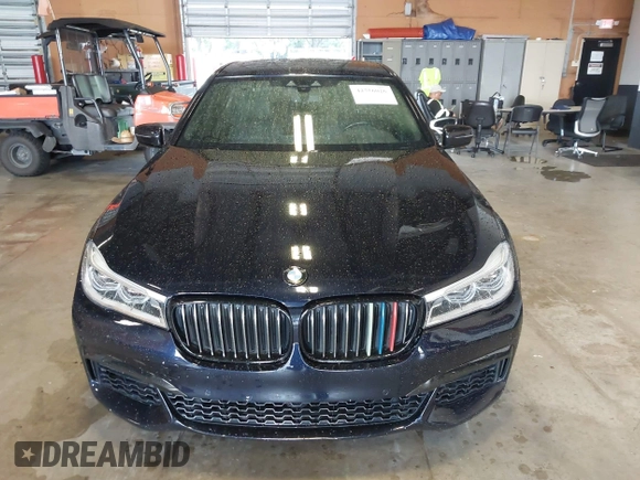 2019 BMW 7 Series 750i xDrive with VIN WBA7F2C51KB239044, listed as a IAAI auction lot 42756026 with 65,028 mi miles and . Bid and sale history available at DreamBid. Image 12.