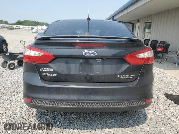 2014 Ford Focus Titanium with VIN 1FADP3J20EL347435, listed as a Copart auction lot 54947345 with 144,169 mi miles and Salvage title. Bid and sale history available at DreamBid. Image 6.