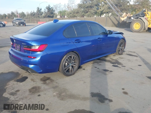 2019 BMW 3 Series 330i xDrive with VIN WBA5R7C50KAE82705, listed as a IAAI auction lot 41233898 with 69,505 mi miles. Bid and sale history available at carsss.com. Image 4.
