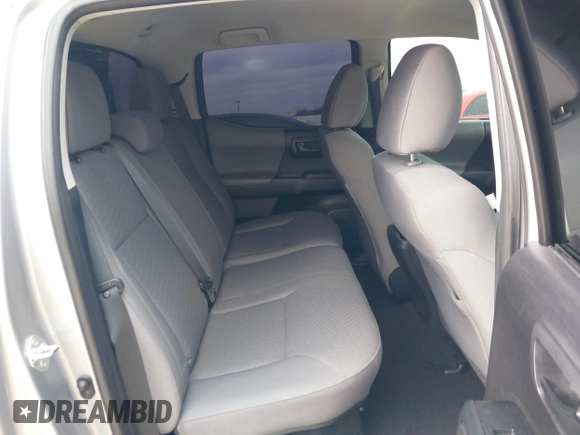 2021 Toyota Tacoma SR with VIN 5TFAX5GN7MX192500, listed as a IAAI auction lot 41674939 with 33,608 mi miles and . Bid and sale history available at DreamBid. Image 8.