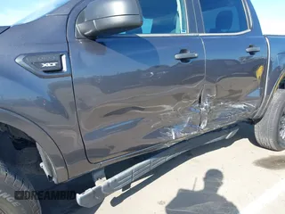 2020 Ford Ranger XL z VIN 1FTER4FHXLLA99641, wystawiony jako IAAI lot #42094134 z przebiegiem 49 788 mil mil oraz . Historia ofert i sprzedaży dostępna na DreamBid. Obrazek 6.