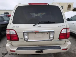2004 Lexus LX 470 with VIN JTJHT00W243543558, listed as a Copart auction lot 74859974 with 189,556 mi miles and Salvage Title. Bid and sale history available at carsss.com. Image 6.