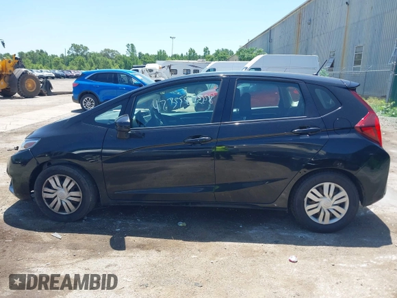 2015 Honda Fit LX z VIN 3HGGK5H56FM712266, wystawiony jako IAAI lot #42378228 z przebiegiem 140 423 mil mil oraz . Historia ofert i sprzedaży dostępna na DreamBid. Obrazek 14.