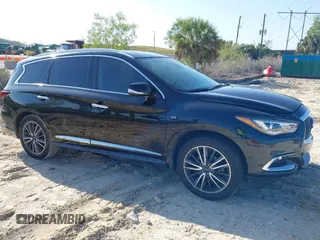 2020 Infiniti QX60 Pure with VIN 5N1DL0MN4LC539573, listed as a IAAI auction lot 42010032 with 104,507 mi miles and . Bid and sale history available at DreamBid. Image 13.