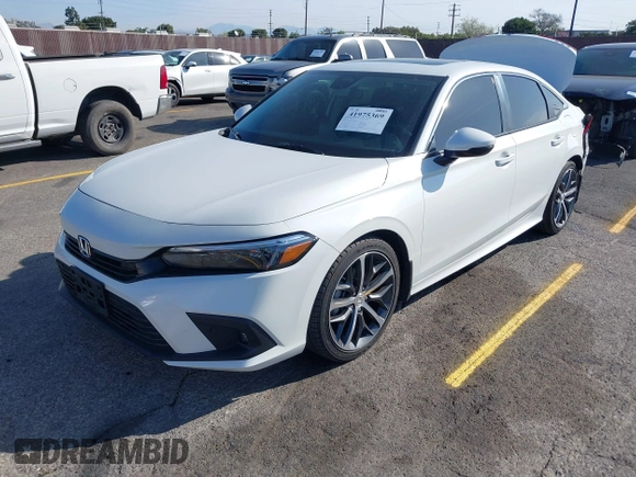 2024 Honda Civic Touring z VIN 2HGFE1F93RH303145, wystawiony jako IAAI lot #41975369 z przebiegiem 32 644 mil mil oraz . Historia ofert i sprzedaży dostępna na DreamBid. Obrazek 17.