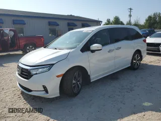 2023 Honda Odyssey Touring with VIN 5FNRL6H81PB001424, listed as a Copart auction lot 61565225 with 35,639 mi miles and Salvage title. Bid and sale history available at DreamBid. Image 1.