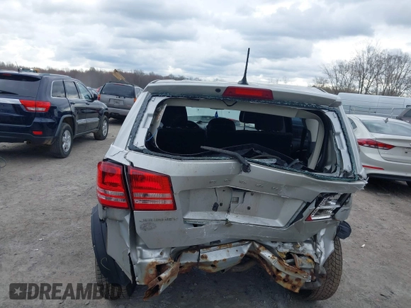 2013 Dodge Journey SE with VIN 3C4PDCAB9DT532554, listed as a IAAI auction lot 42026129 with 164,599 mi miles. Bid and sale history available at carsss.com. Image 6.